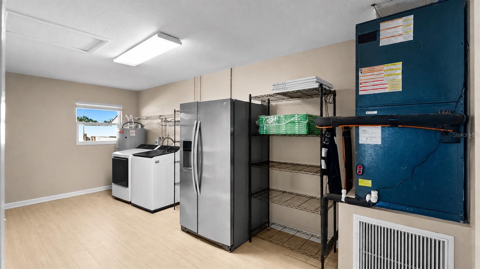 HUGE Laundry Room with new washer & dryer