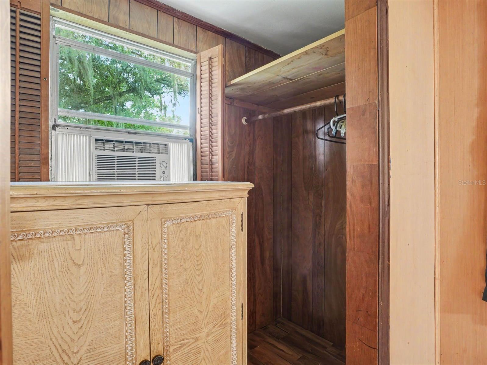 Master Bedroom with Walk-In Closet, Window AC Unit & Relaxing Forest Views