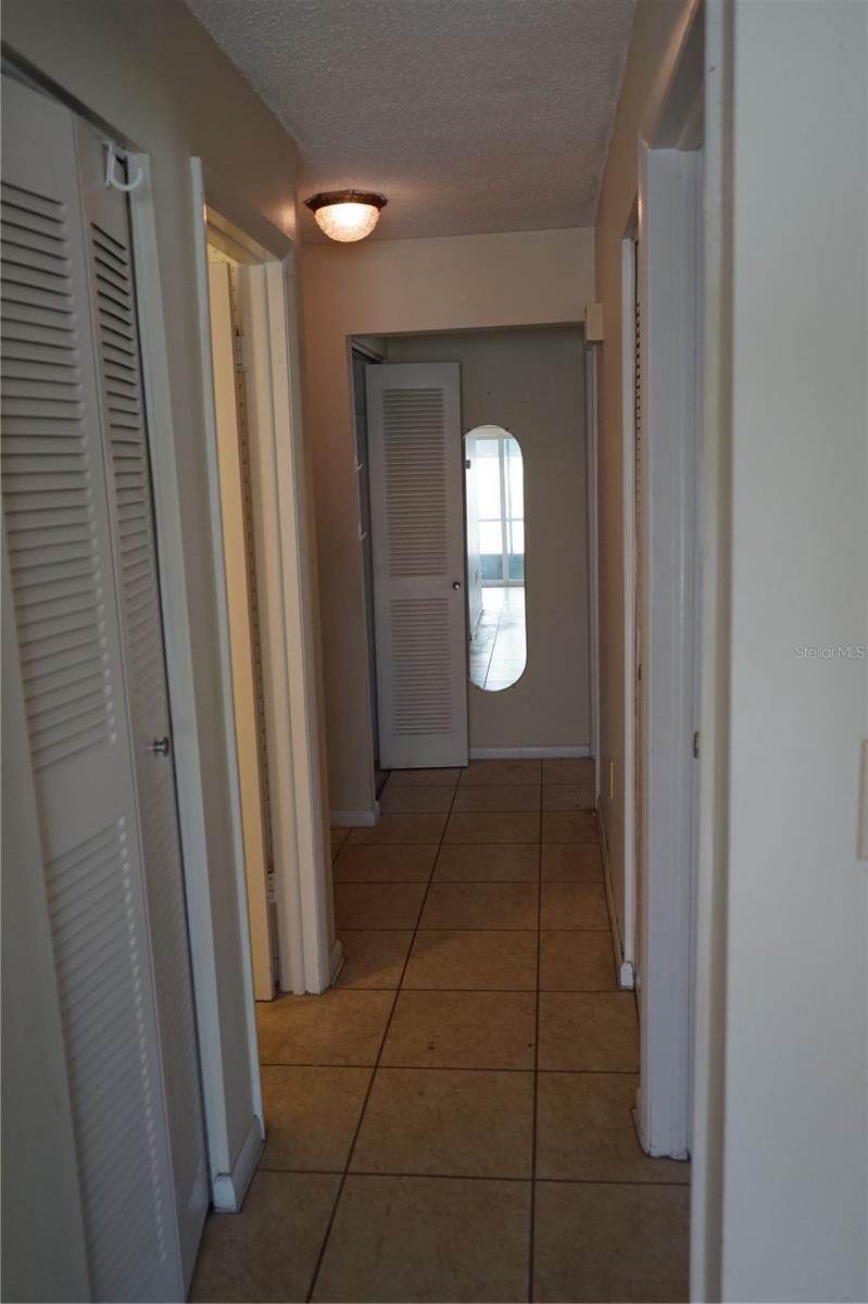 hallway to bedrooms and bath