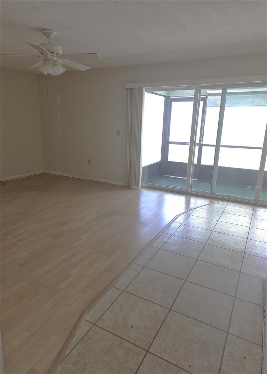 living room with slider to lanai