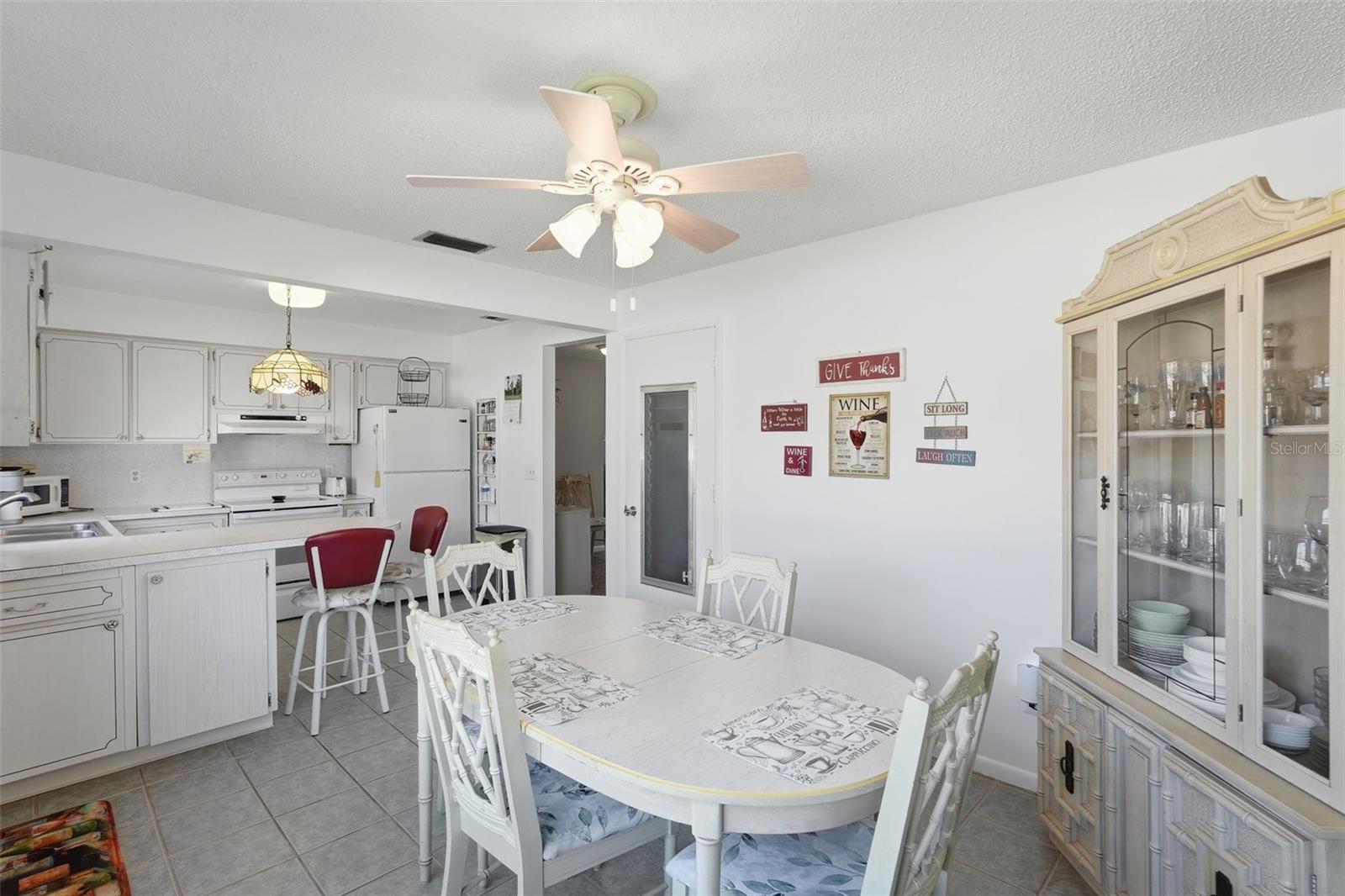 Additional view of the dining area with abundant natural light.