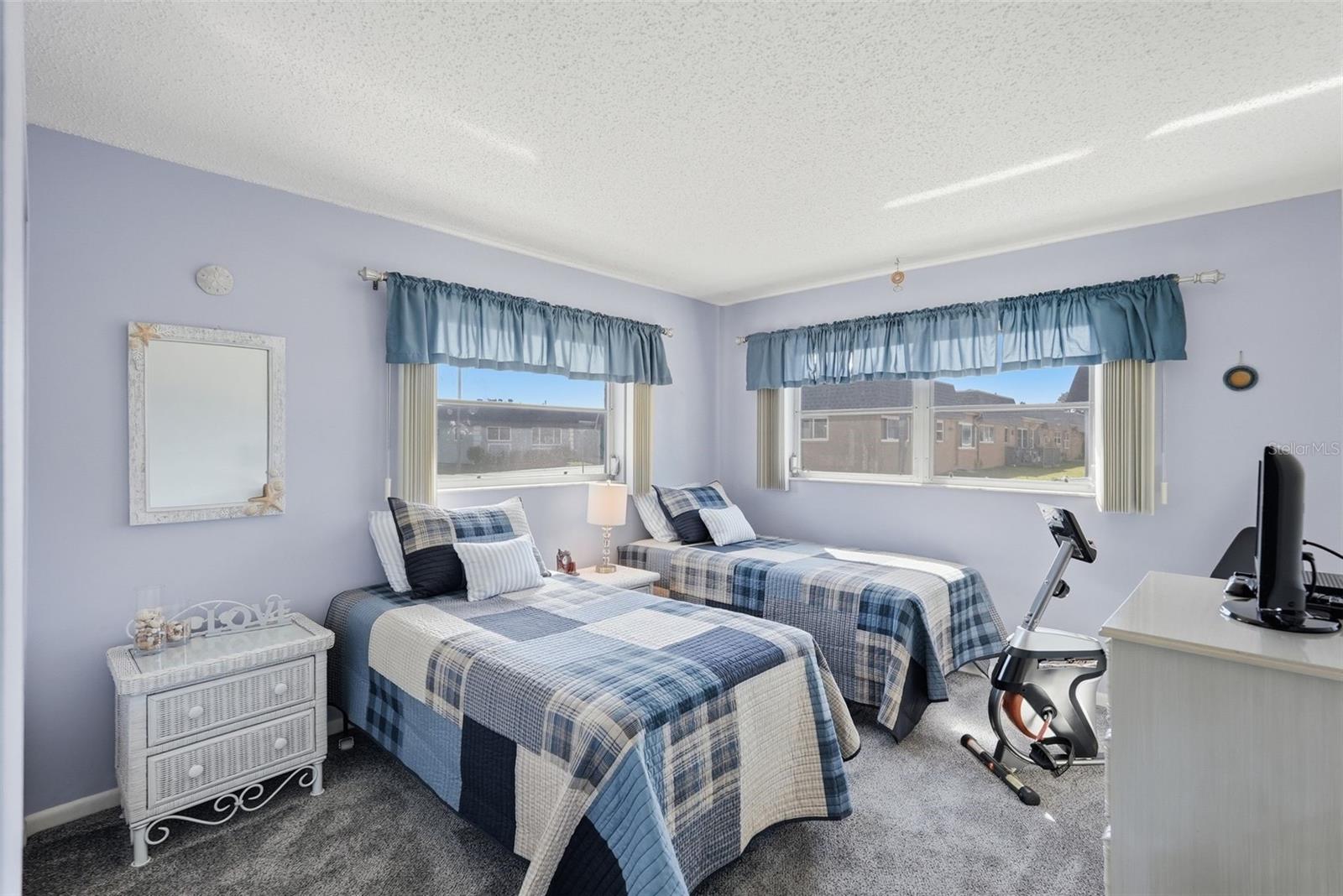 Bedroom 2, featuring twin beds, natural light. Bedroom 2, featuring twin beds, natural light.