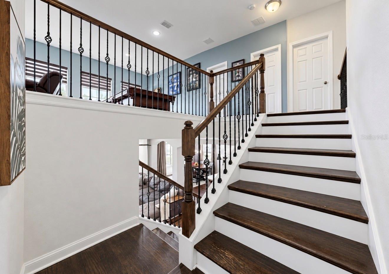 WOOD SWITCHBACK STAIR CASE CUSTOM SPINDLES