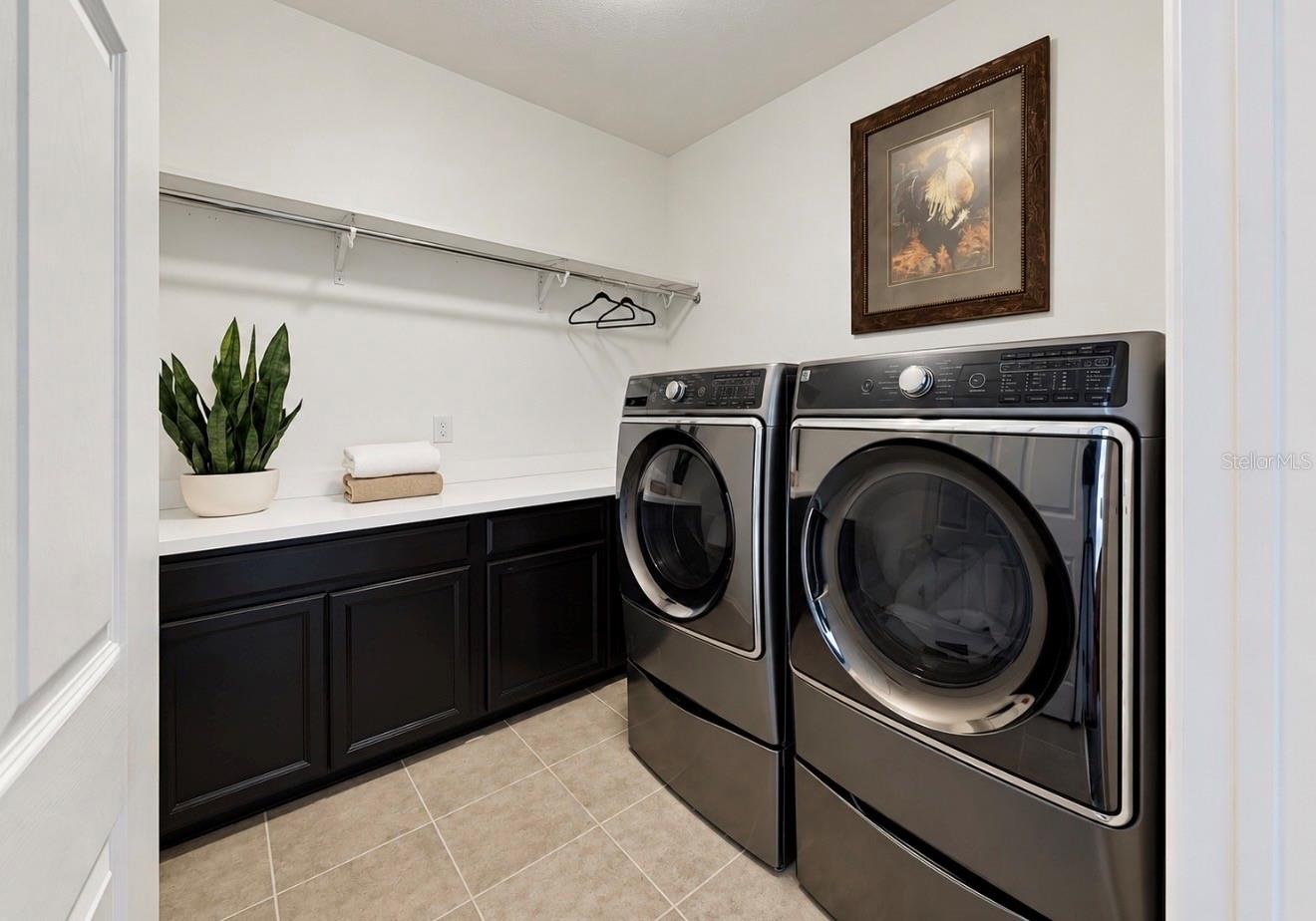 UPSTAIRS LAUNDRY ROOM-WITH BUILT IN STORAGE