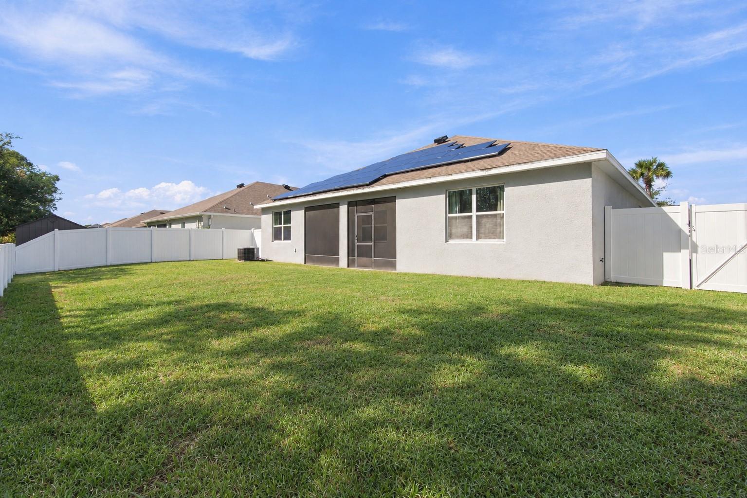 Backyard facing house