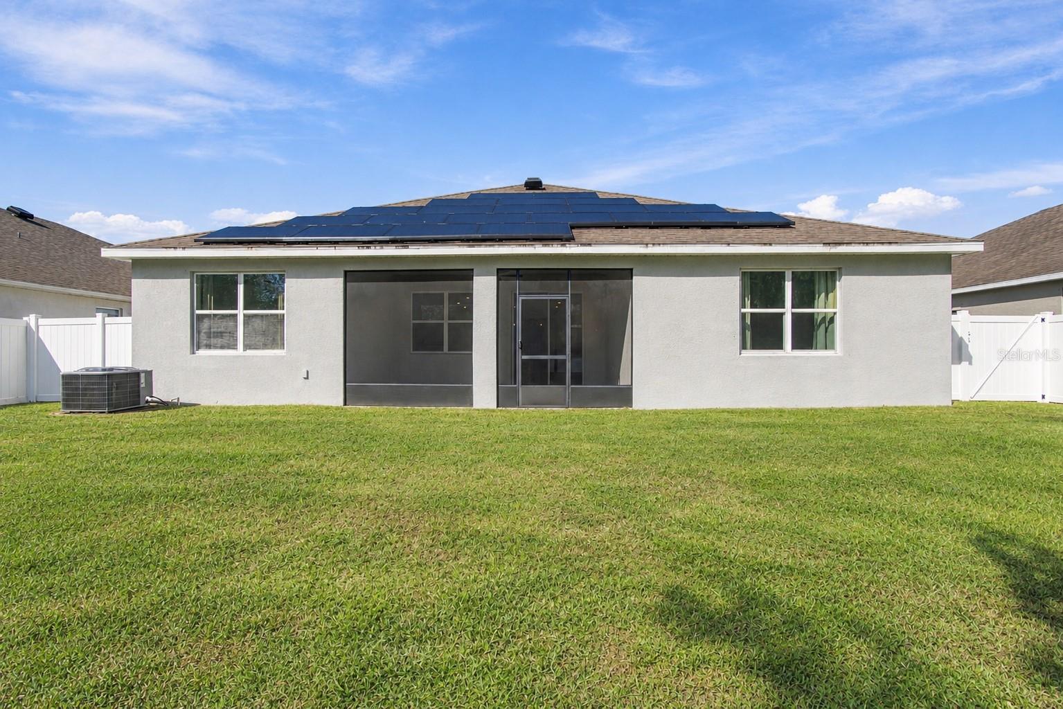 Backyard facing house (centered)