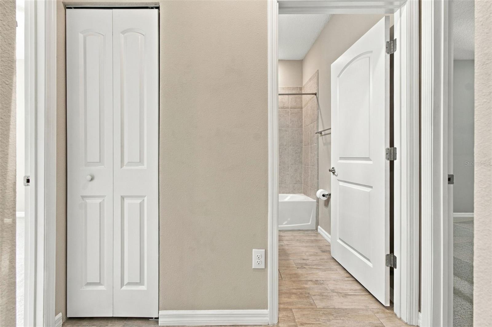 Linen Closet to the left, Full Bathroom to the right