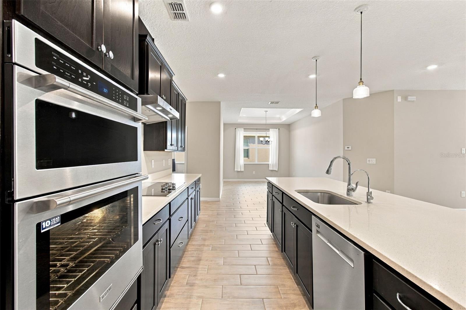 Kitchen with Maytag and Whirlpool stainless steel appliances
