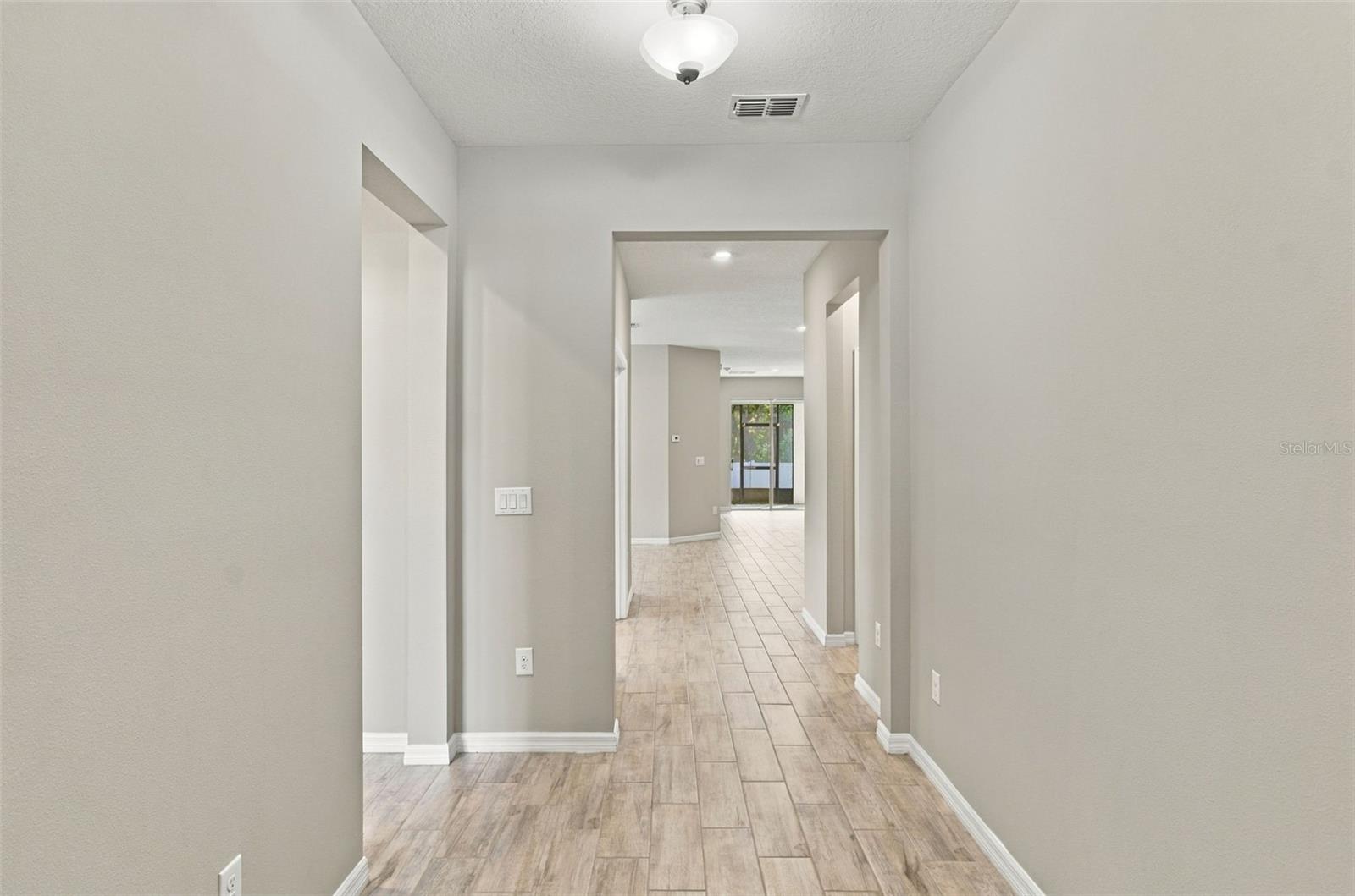 Hallway leaving guest suite and heading to office