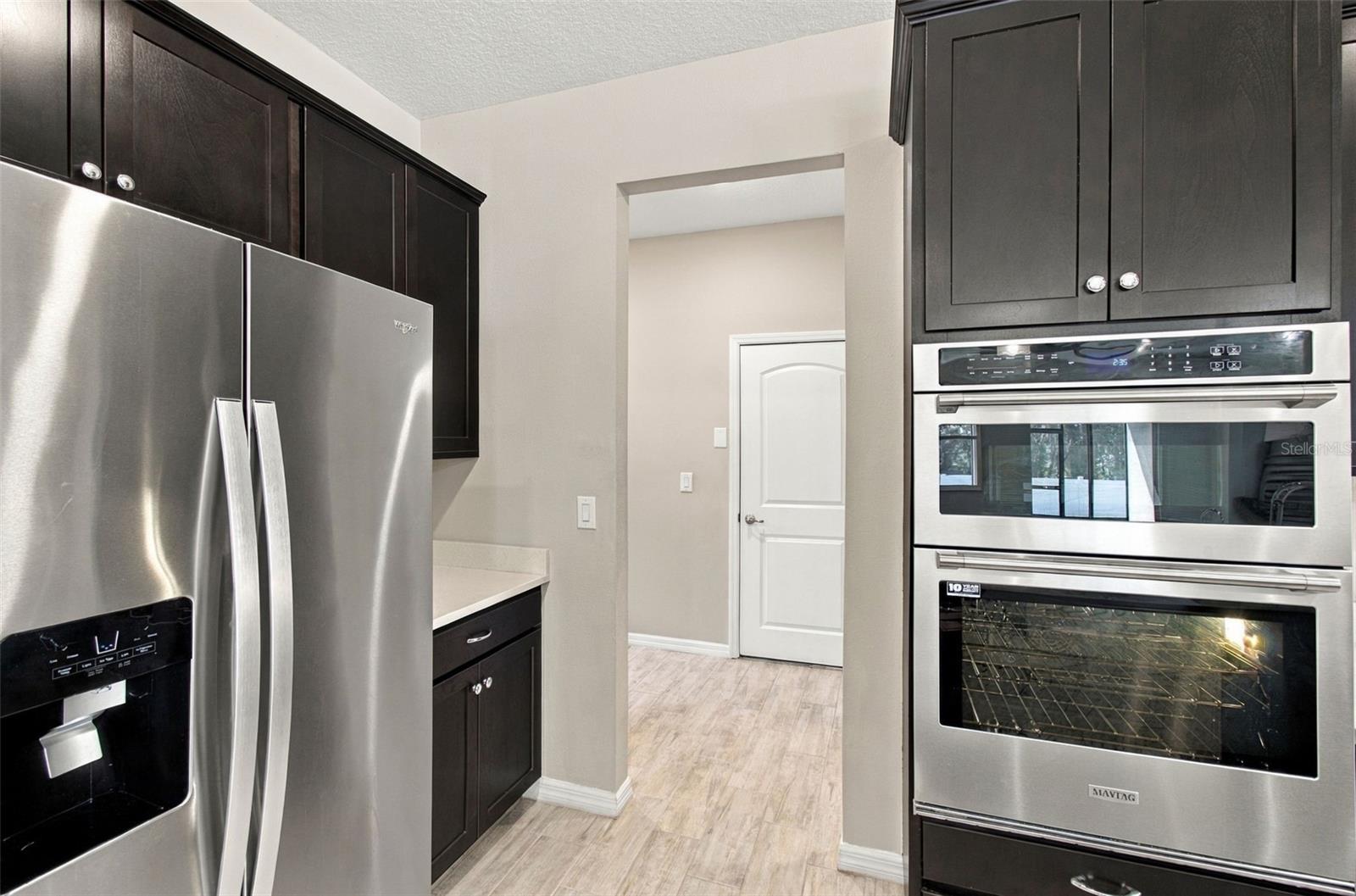 Whirlpool refrigerator with reverse osmosis filtered water and ice from door dispenser