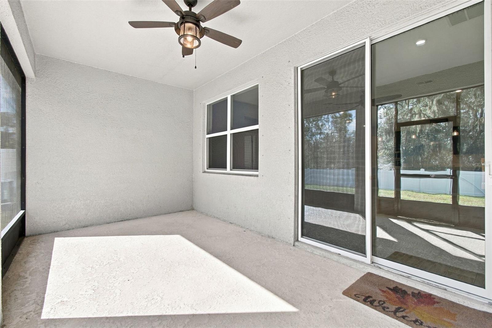 Screened-in Patio with ceiling fan