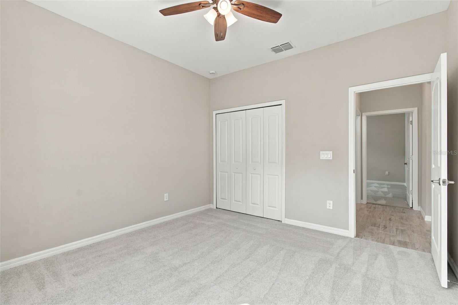 Bedroom with ceiling fan