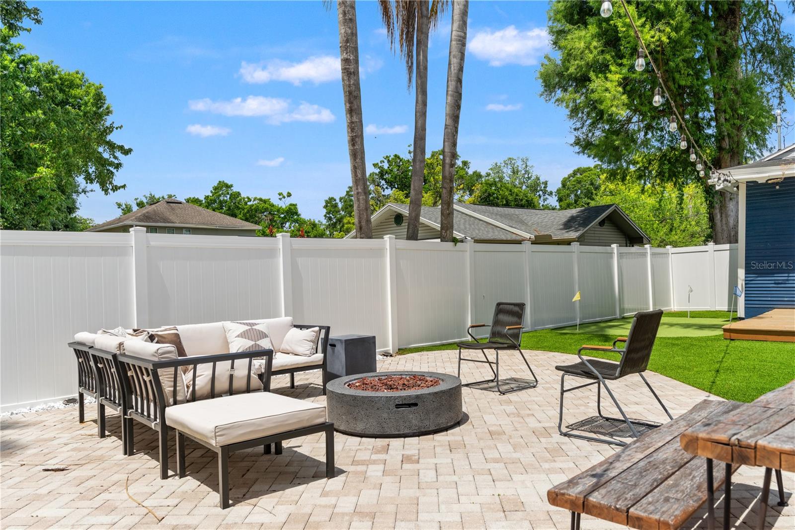 Backyard with fire pit & turf