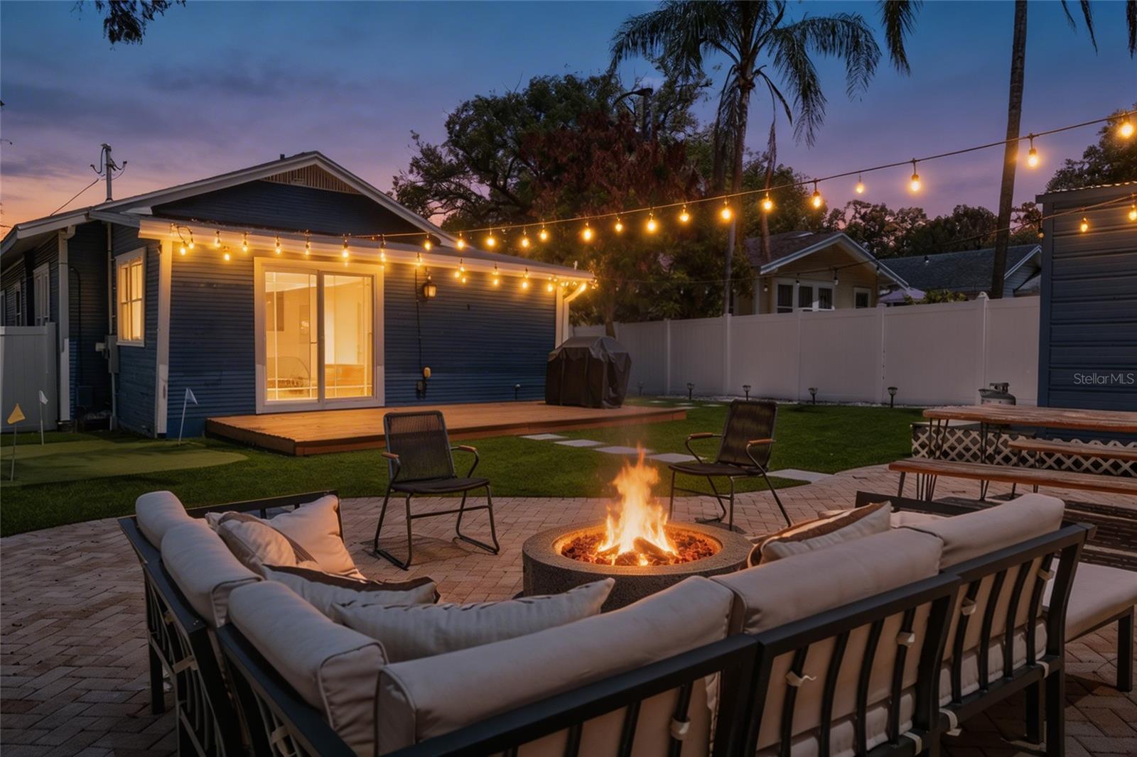 Backyard with fire pit & turf