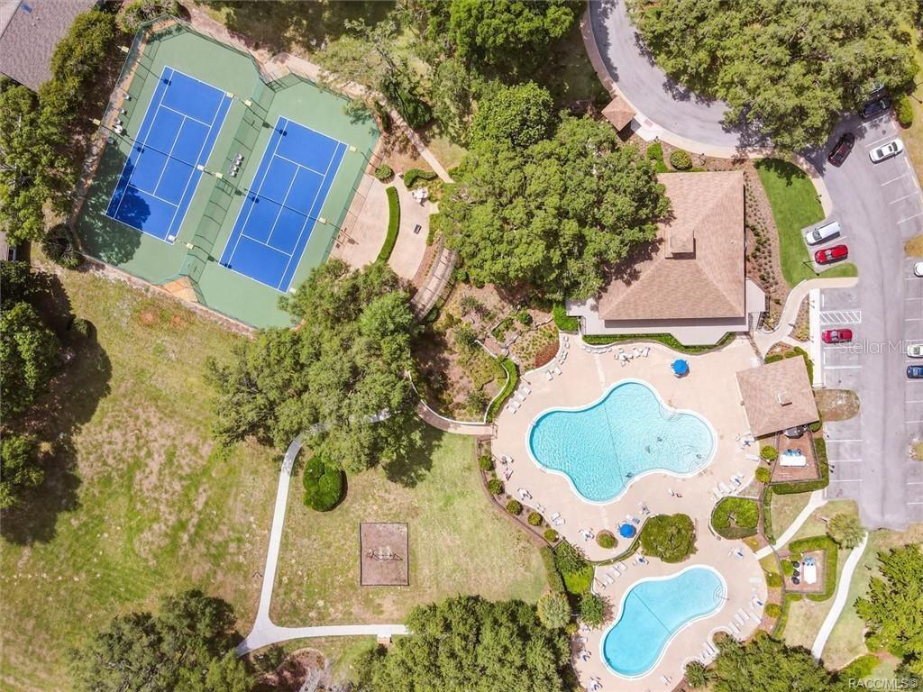 RECREATIONAL AMENITIESRESORT-STYLE RECREATION AT YOUR FINGERTIPS! An impressive aerial view showcasing Meadowcrest's TWO COMMUNITY POOLS, TENNIS COURTS, clubhouse area & beautifully landscaped recreational grounds!