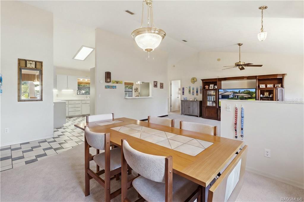 GATHER AROUND THE TABLE! Enjoy the comfortable FORMAL DINING AREA w/an open connection to the living room & kitchen!