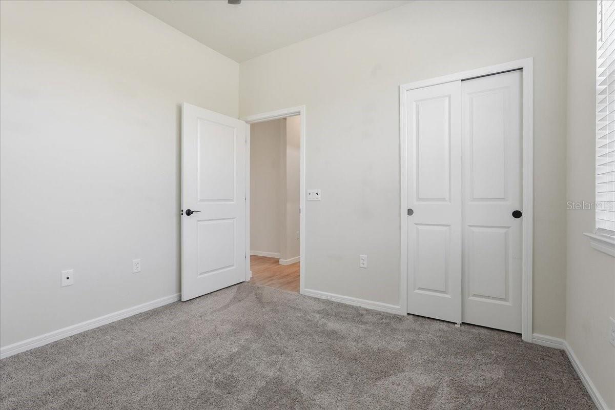 Bedroom 2 with Lighted Ceiling Fan