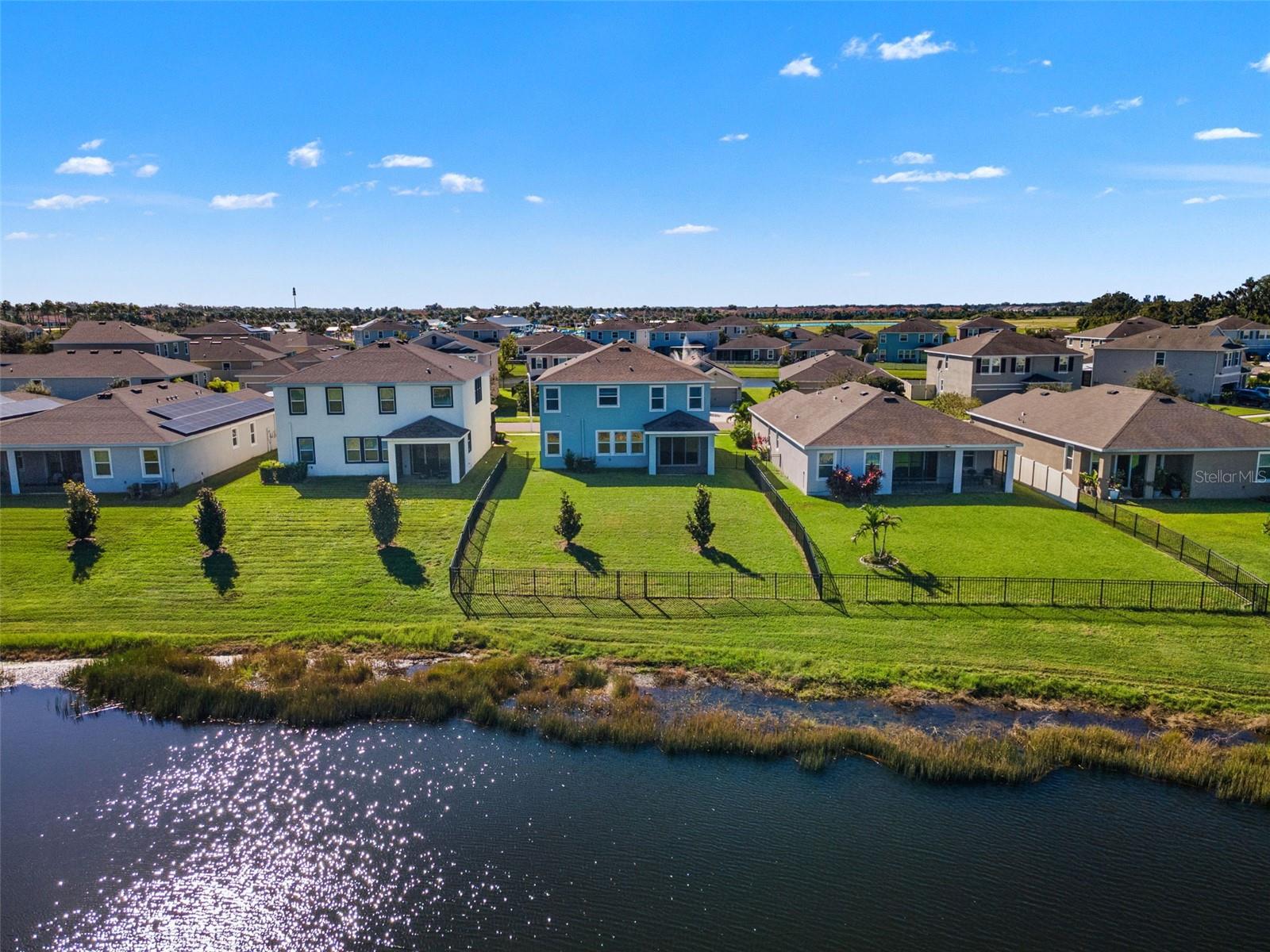 Rear aerial and pond-side yard - 5126 Jackel Chase Dr, Wimauma Rear aerial and pond-side yard - 5126 Jackel Chase Dr, Wimauma