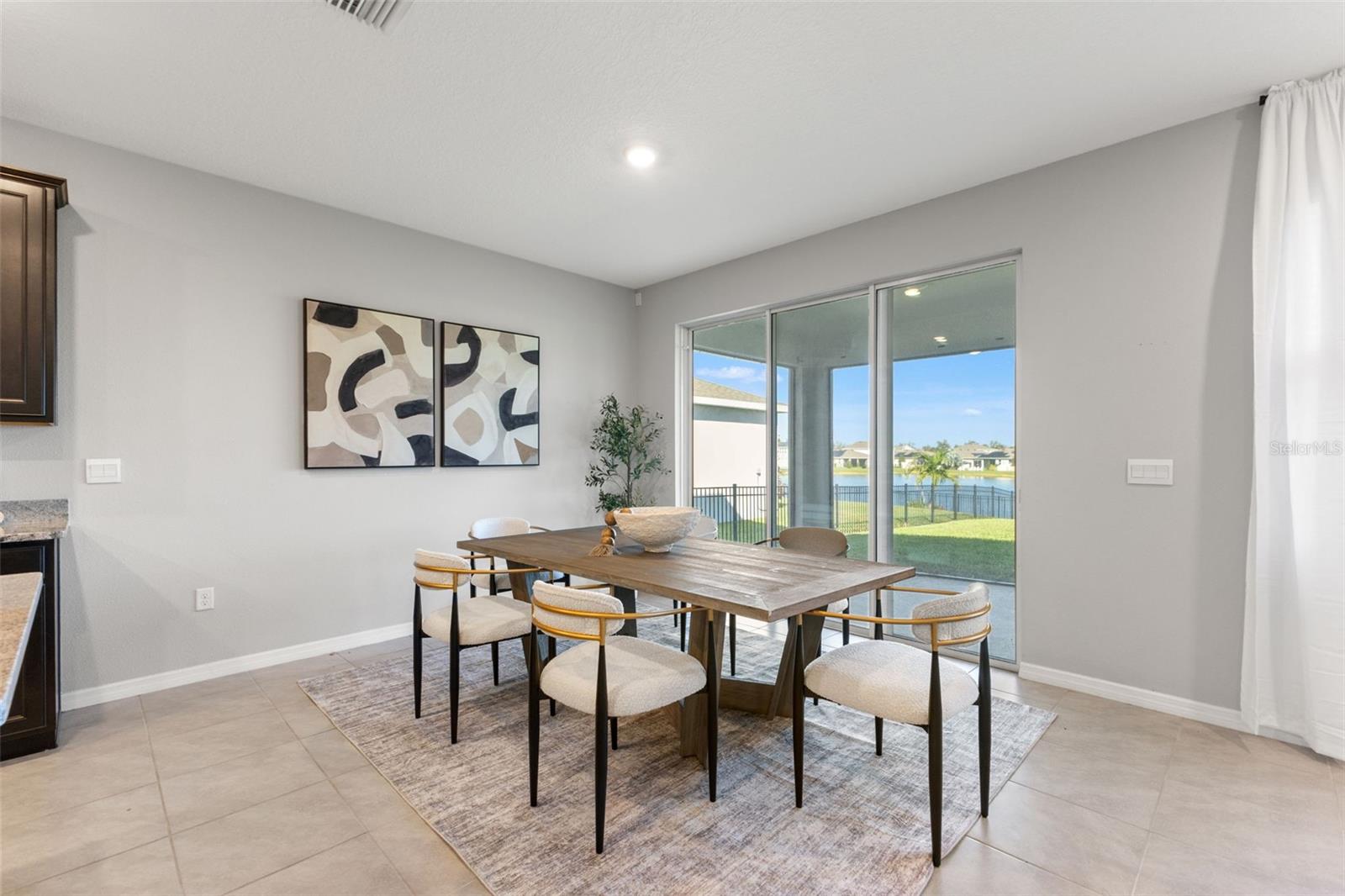 Dining area and slider - 5126 Jackel Chase Dr, Wimauma Dining area and slider - 5126 Jackel Chase Dr, Wimauma