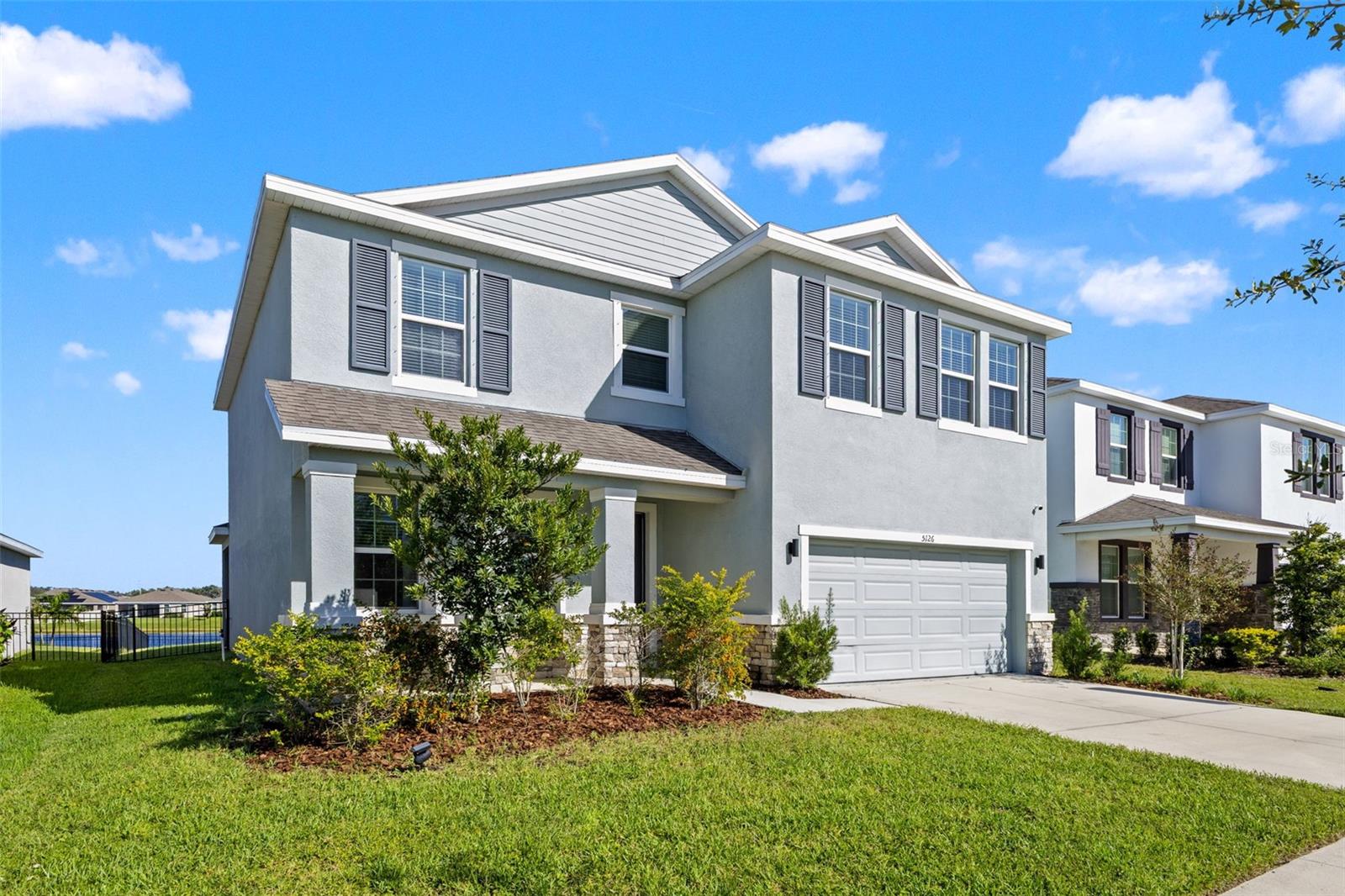 Front exterior left angle - 5126 Jackel Chase Dr, Wimauma Front exterior left angle - 5126 Jackel Chase Dr, Wimauma