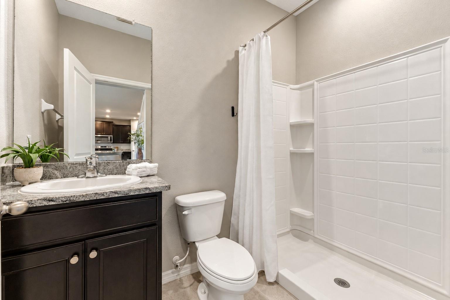 Downstairs bathroom with shower - 5126 Jackel Chase Dr, Wimauma