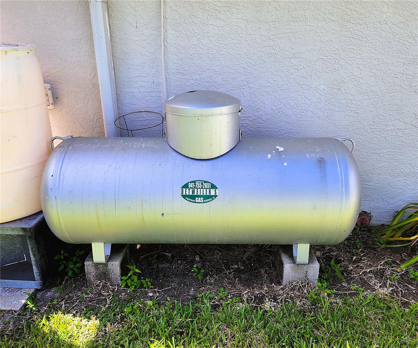 Propane Gas for the Water heater and fireplace. The kitchen is piped for a gas stove.