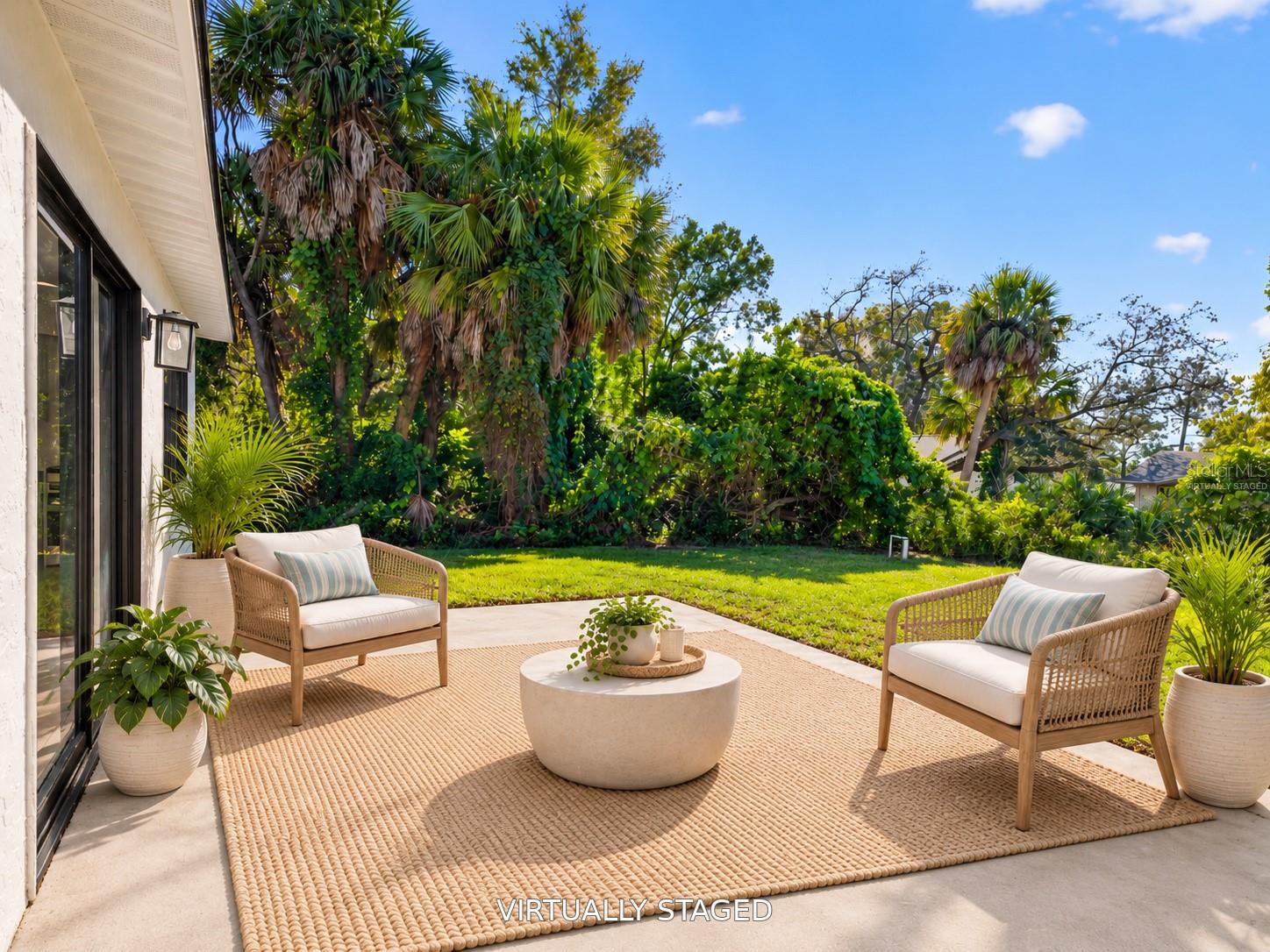 VIRTUALLY STAGED. Imagine morning coffee or evening conversations on your private patio.