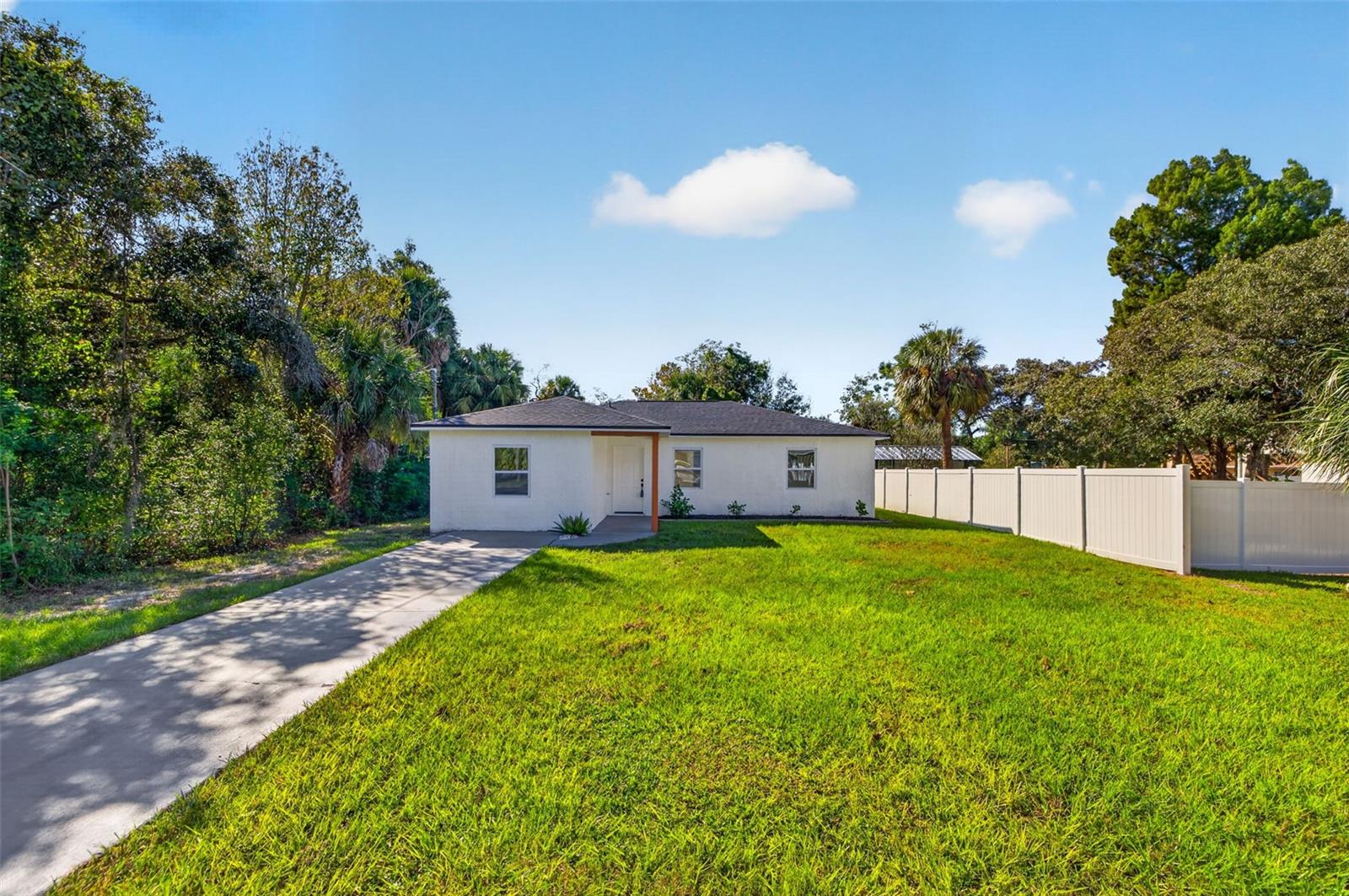 Extended driveway offers parking for up to four vehicles. Extended driveway offers parking for up to four vehicles.