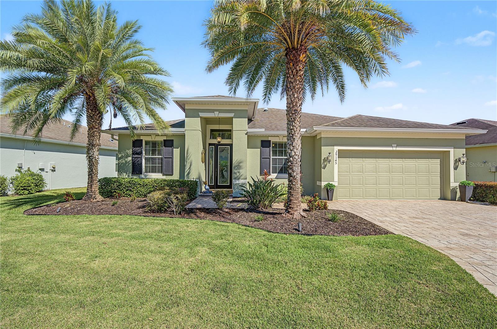 Tropical landscape adds to curb appeal