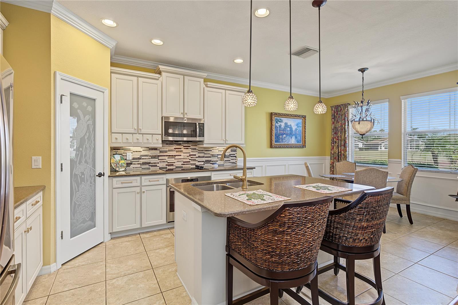 Custom pantry door and premium cabinets