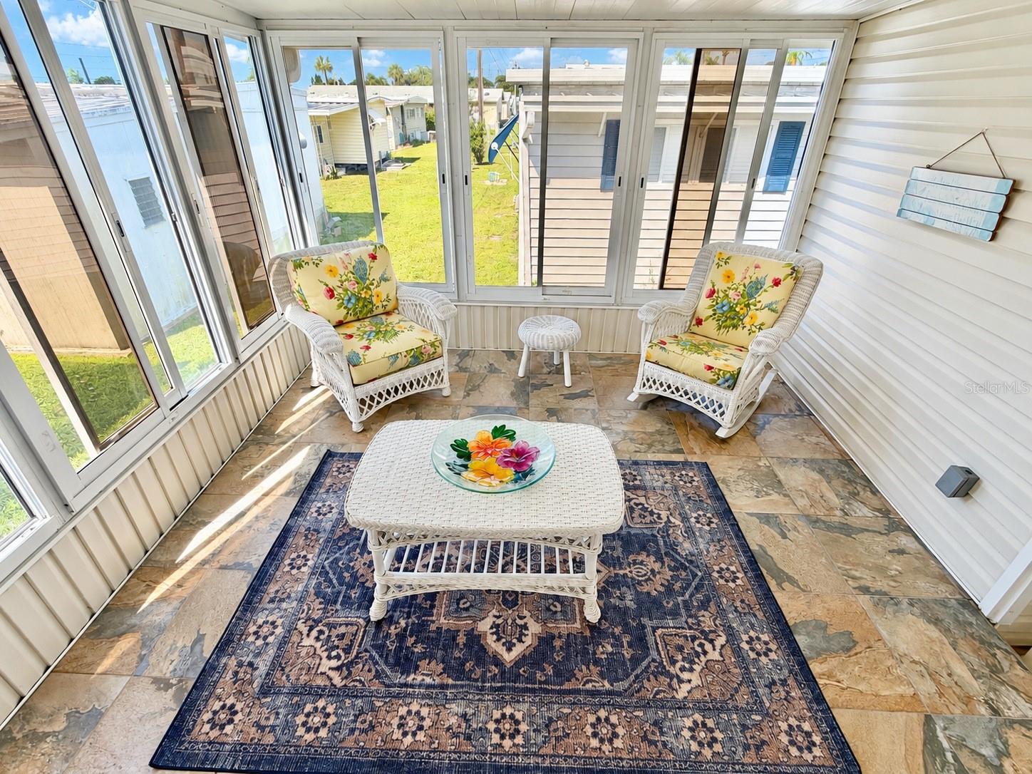 Sunroom - sliding windows, shown open here