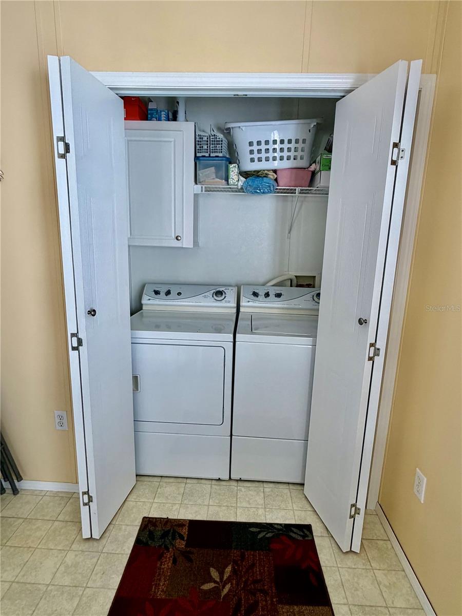 Indoor Laundry room at the back of the kitchen