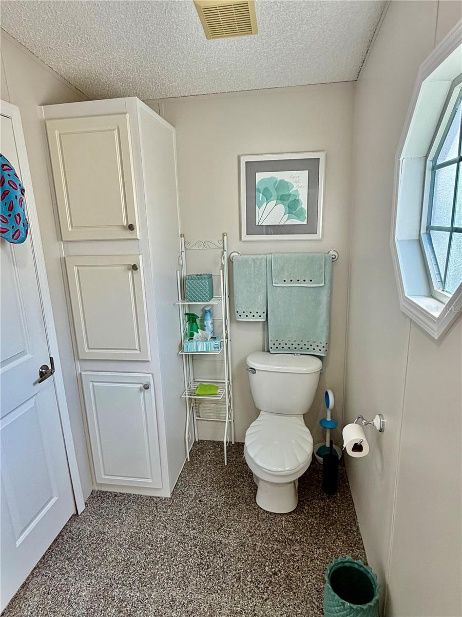 Primary suite as a separate shower and toilet room