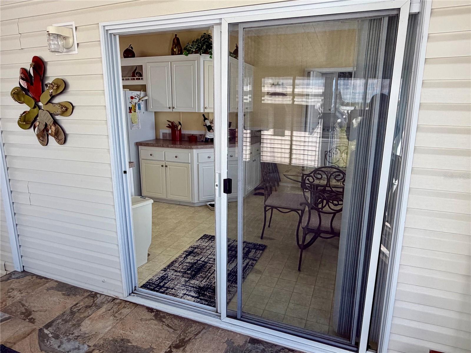 Sliding doors lead to the kitchen