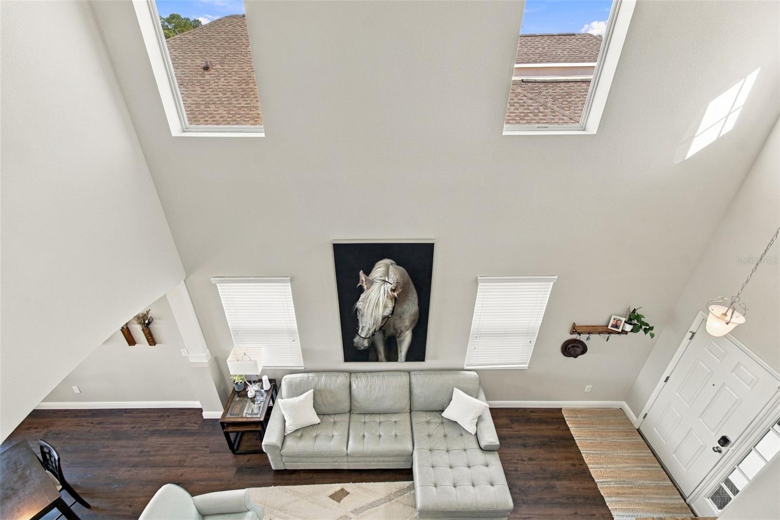 View down to living room and entry