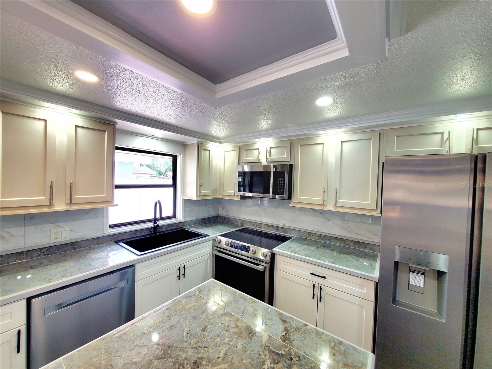 UPDATED CABINET & COUNTERTOPS