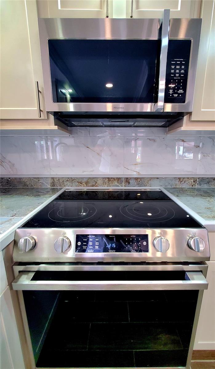 NEW STAINLESS STEEL APPLIANCES