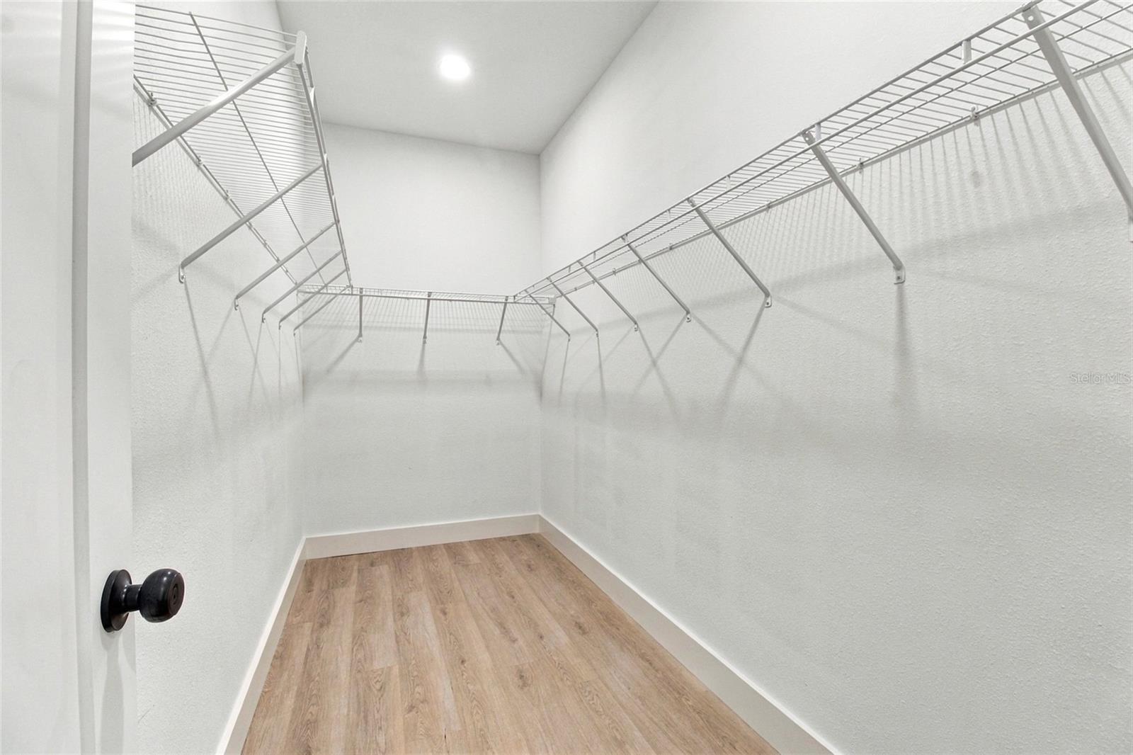 primary bedroom walk-in closet