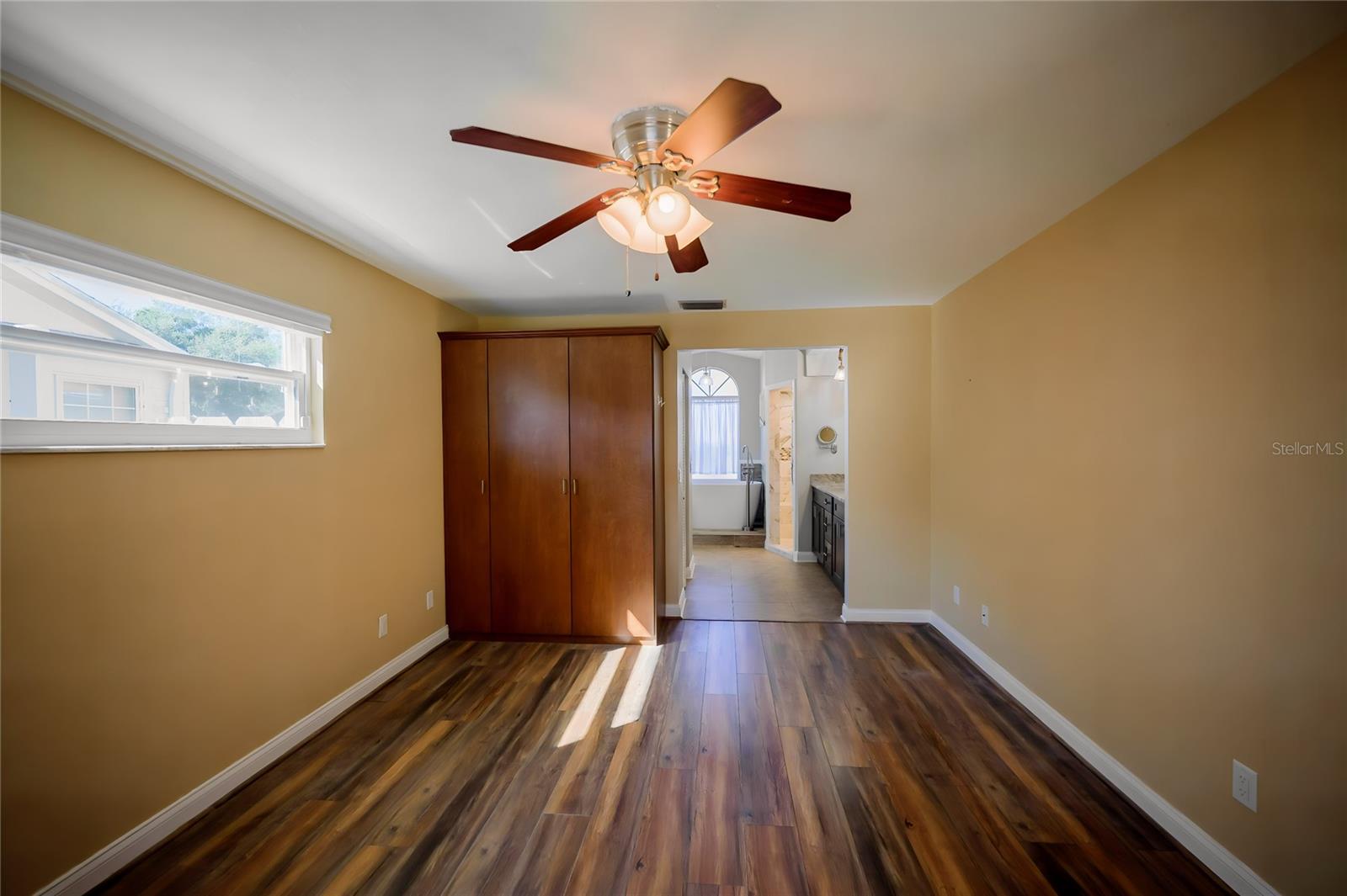 Primary with Built-in and Walk-in his/hers closets