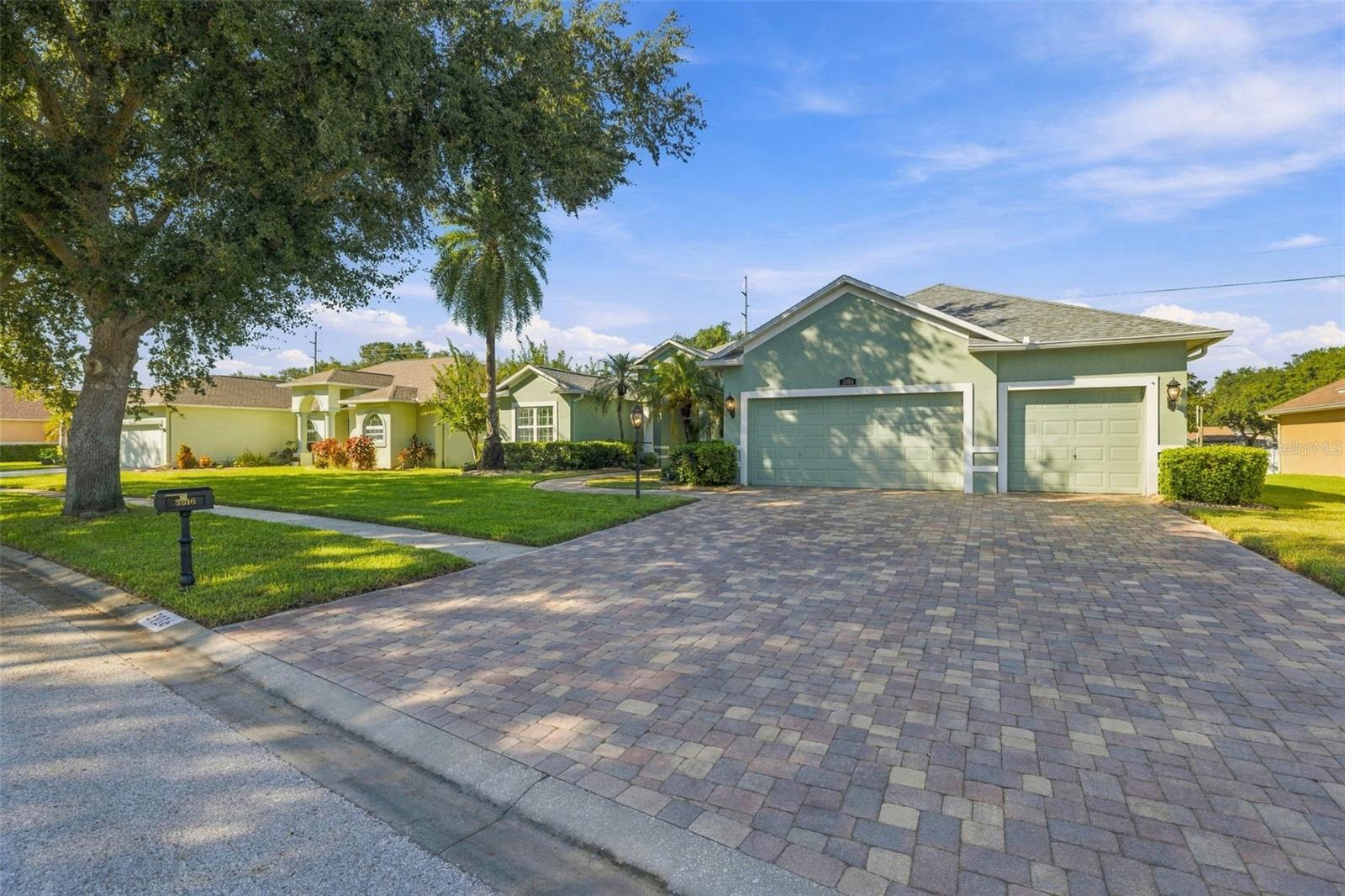 Entry Sidewalk &  Driveway all in Pavers to marvel at your home!