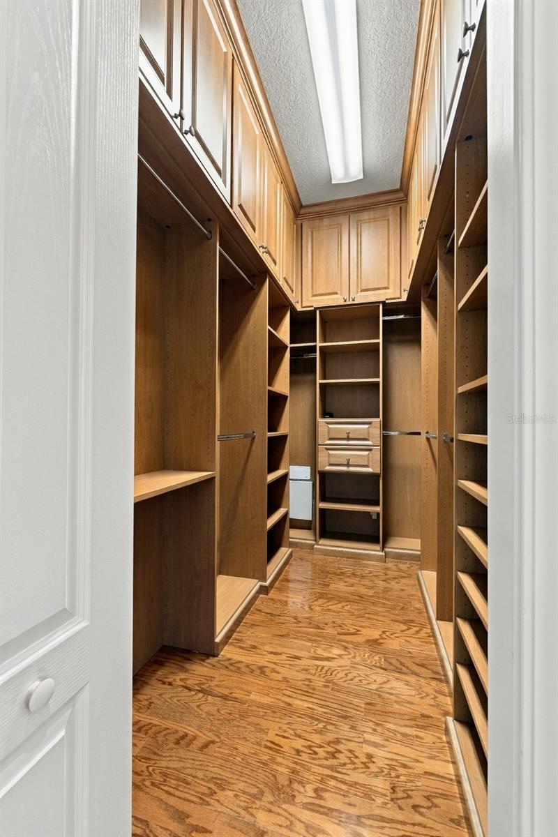 Primary Closet all adorned with Built Ins!