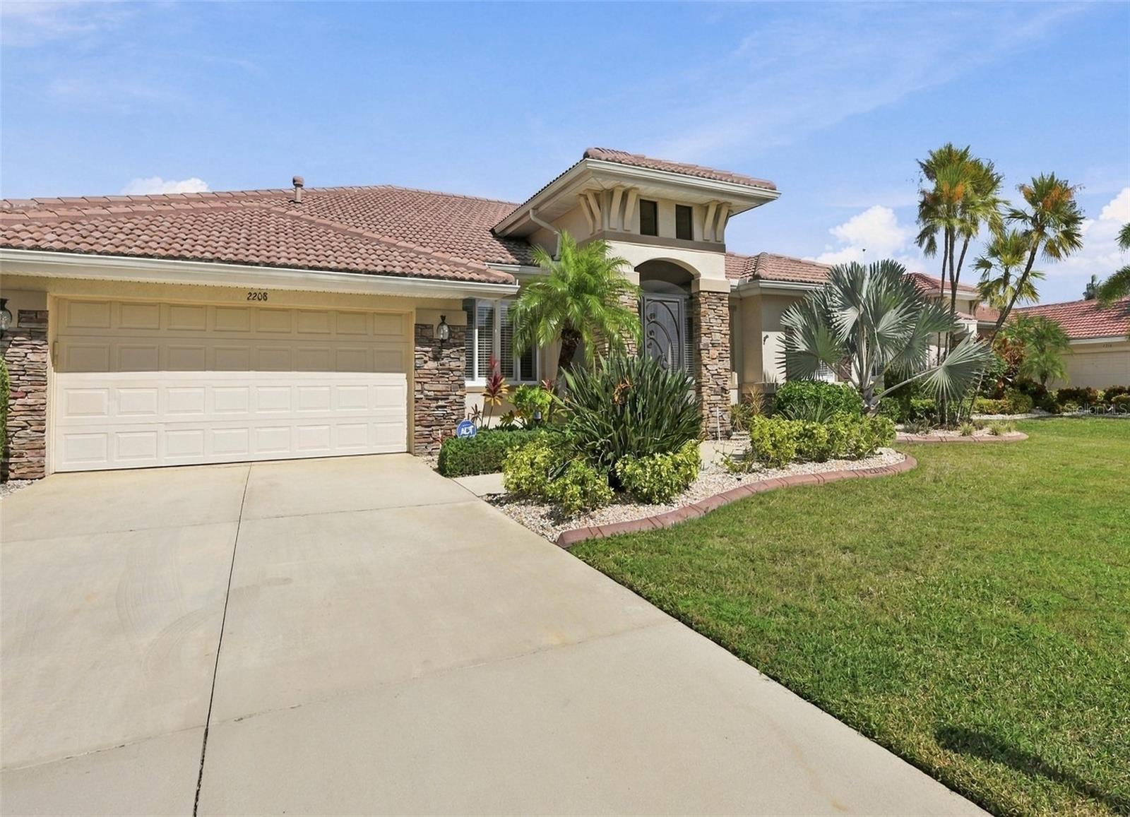 Wide driveway and double garage ensures plenty of parking space for family and friends. Wide driveway and double garage ensures plenty of parking space for family and friends.