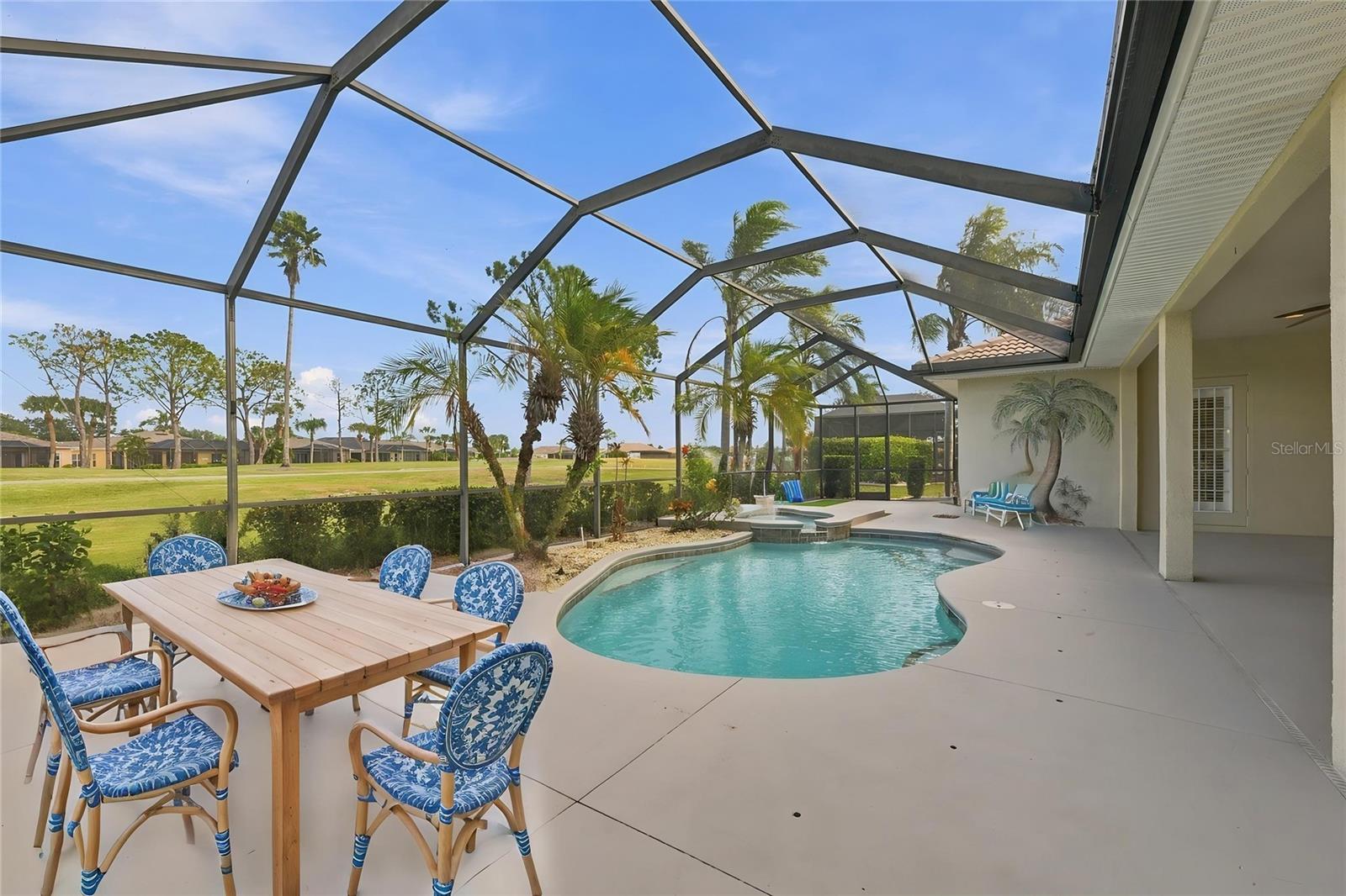 VIRTUAL STAGING - A stunning golf course and pool view.