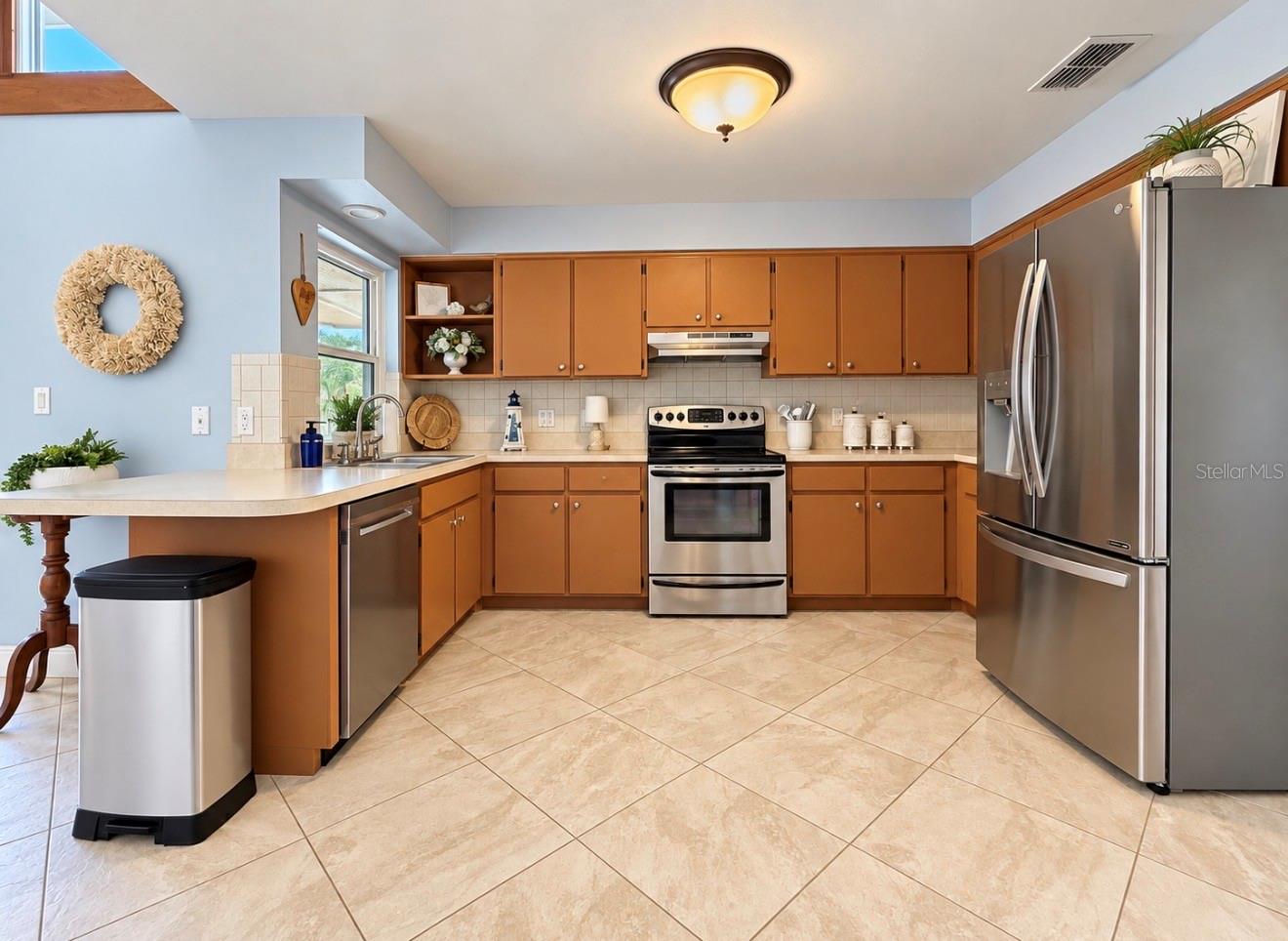 Kitchen with stainless steel appliances