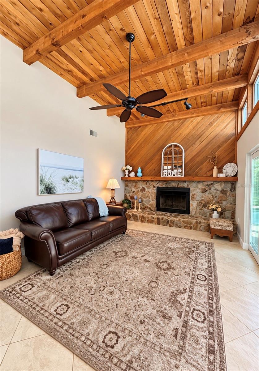 Family room with natural light and fireplace