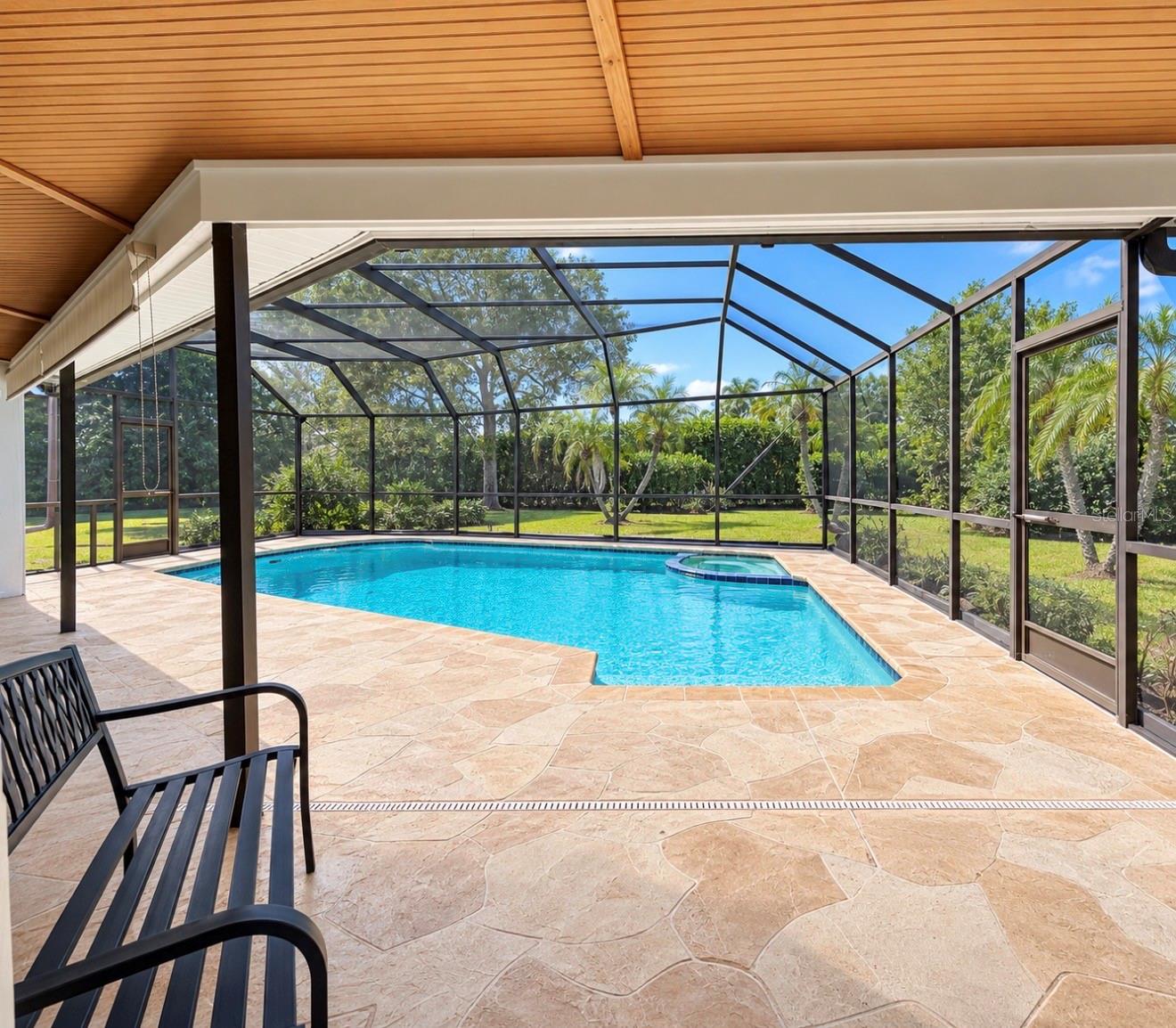 Pool covered lanai or primary bedroom