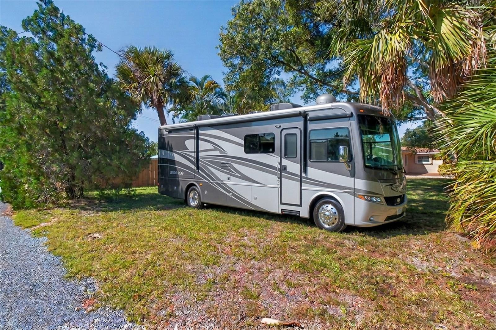 Virtually Staged - Back part of the over sized lot has plenty of room for an RV, Boat, or multiple vehicles.