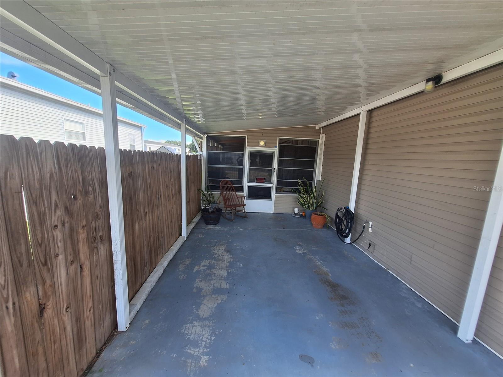 Carport provides a great place to park enabling you to stay out of the Florida weather.