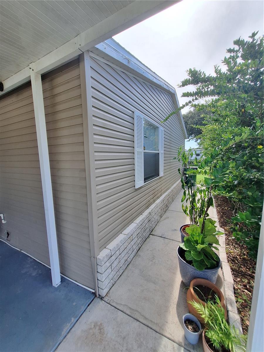 Front walkway can be made even more inviting with additional plants for outside decoration.