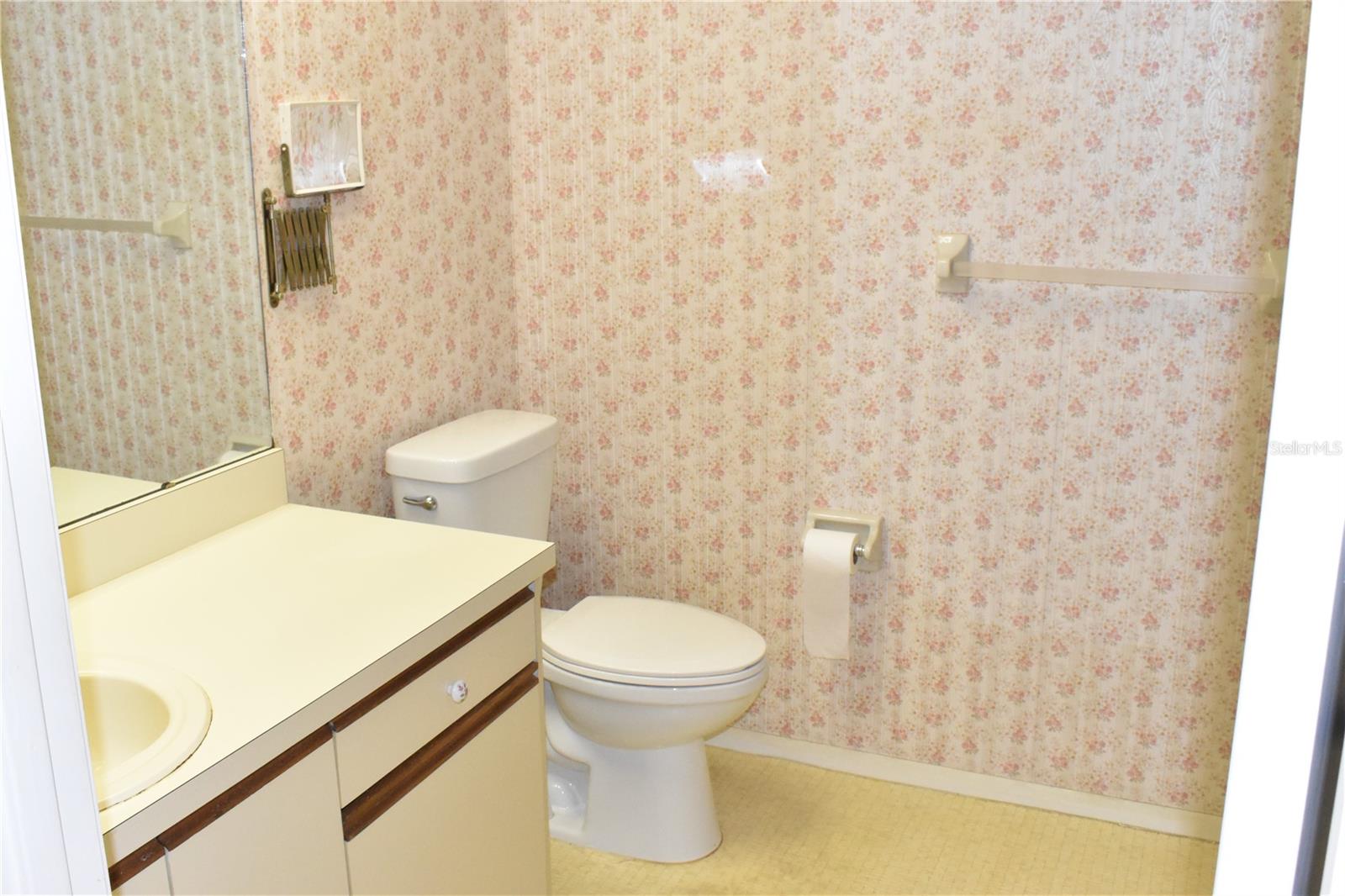 Primary Bathroom with a walk-in shower